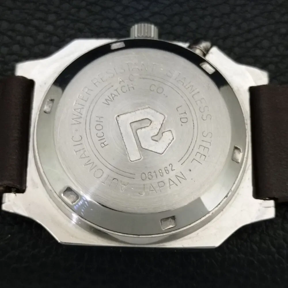Vintage 1988 Ricoh Automatic Mens Silver Watch W/daydate & Gold accents